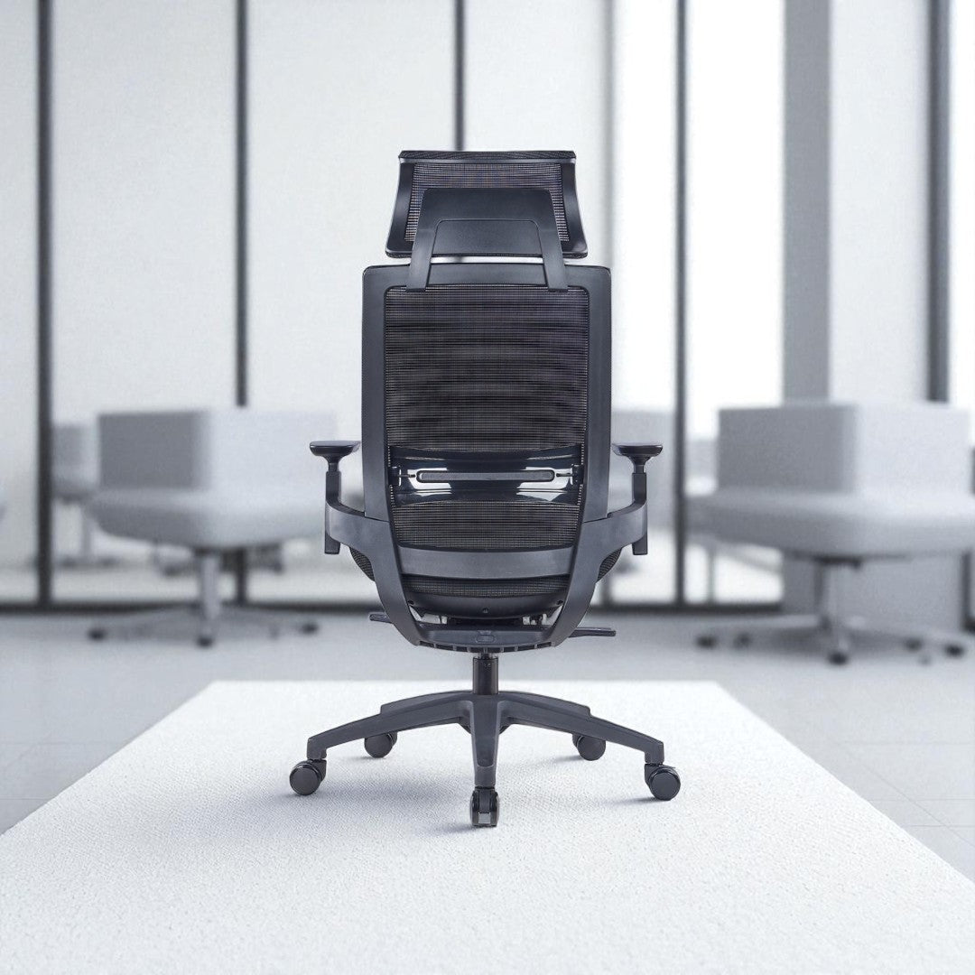 Black office chair in a modern office setting with blurred background