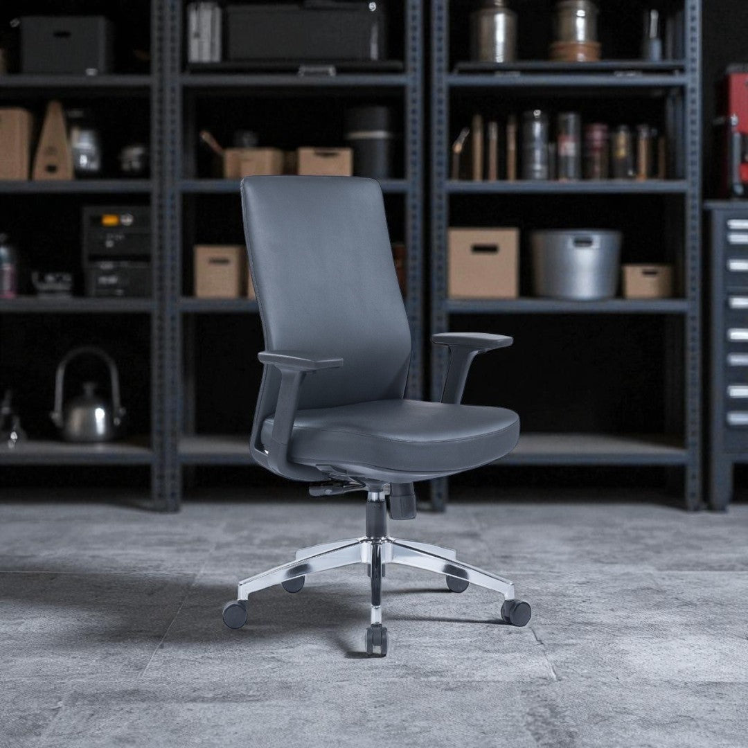 Gray office chair in a room with shelves and equipment