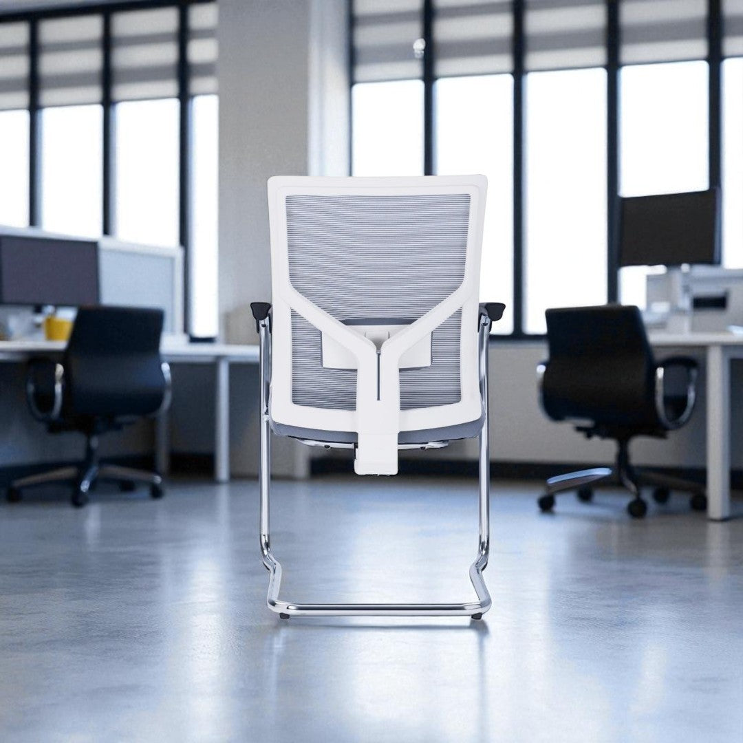 Modern office chair in a blurred office setting with desks and chairs.