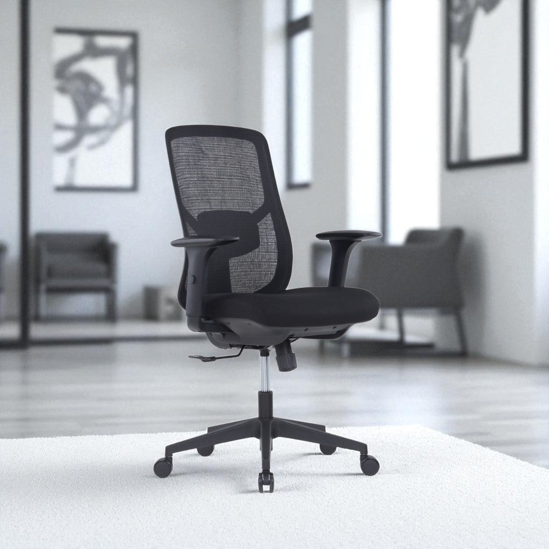 Black office chair in a modern office setting with large windows.