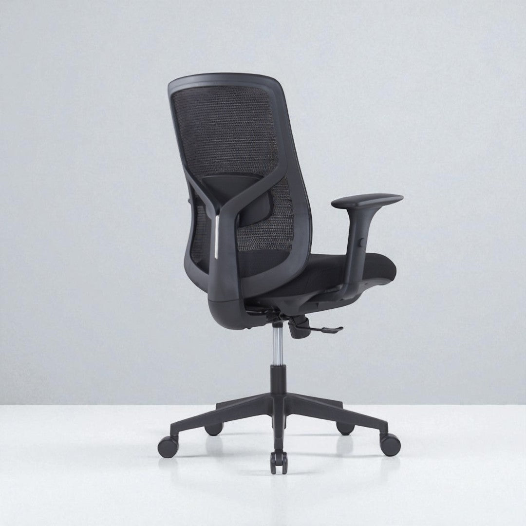Black office chair with mesh back on a white background
