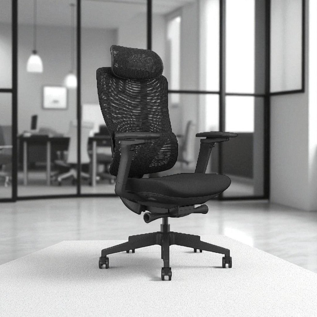 Black office chair in a modern office setting with large windows.